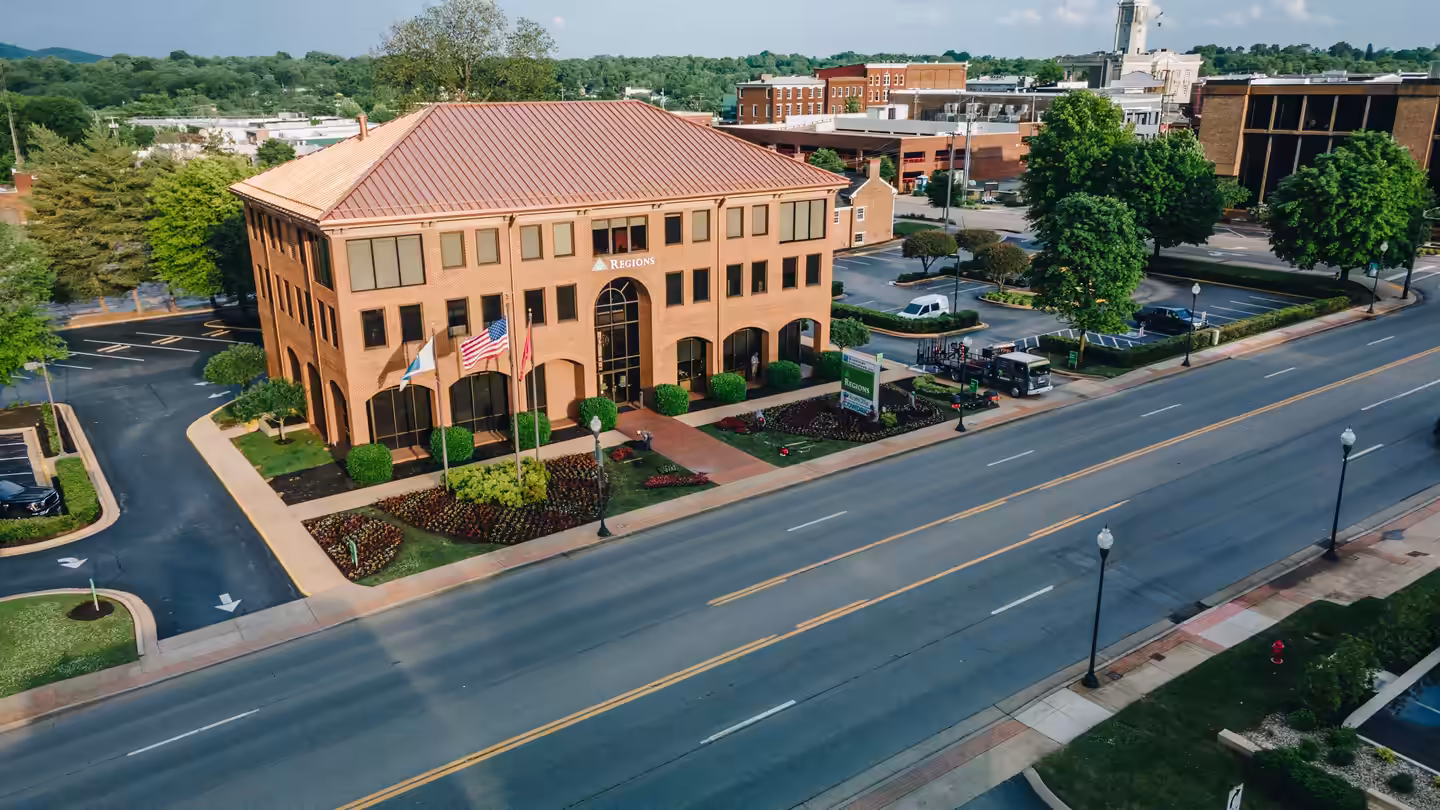Aerial view of a downtown Columbia office building and its seasonal color beds, a Richardson job