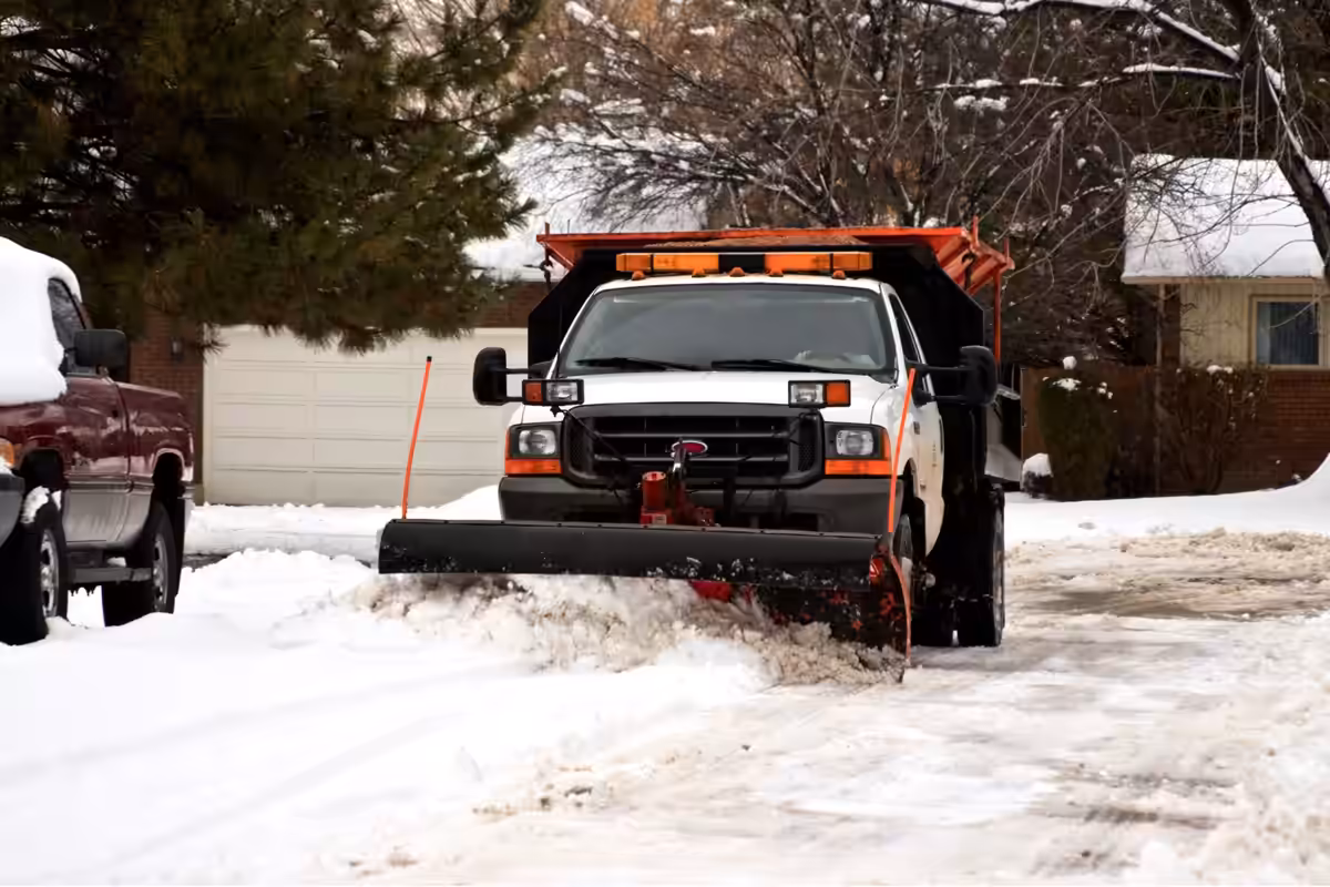 Richardson plow truck clearing a drive