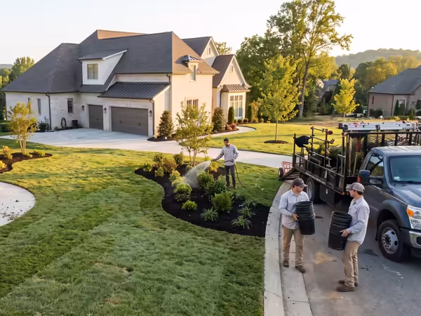 Richardson crew finishing a new front-yard installation at golden hour
