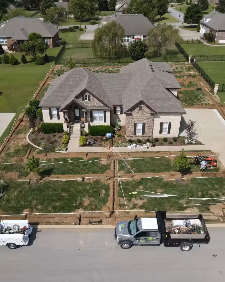 Aerial view of a whole yard with every irrigation zone trenched