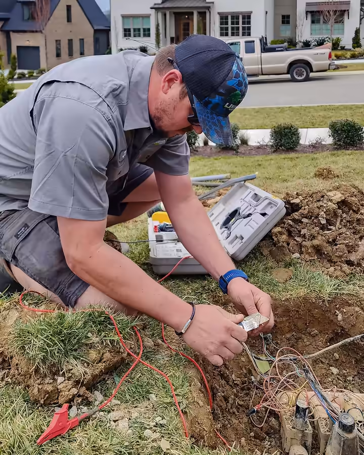 Richardson irrigation tech wiring a valve box